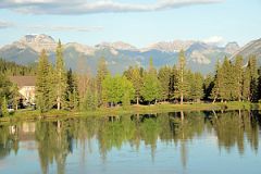 17 Bow River In The Early Morning With Mount Bourgeau, Mount Brett, Massive Mountain and Pilot Mountain Glow From Bow River Bridge In Banff In Summer